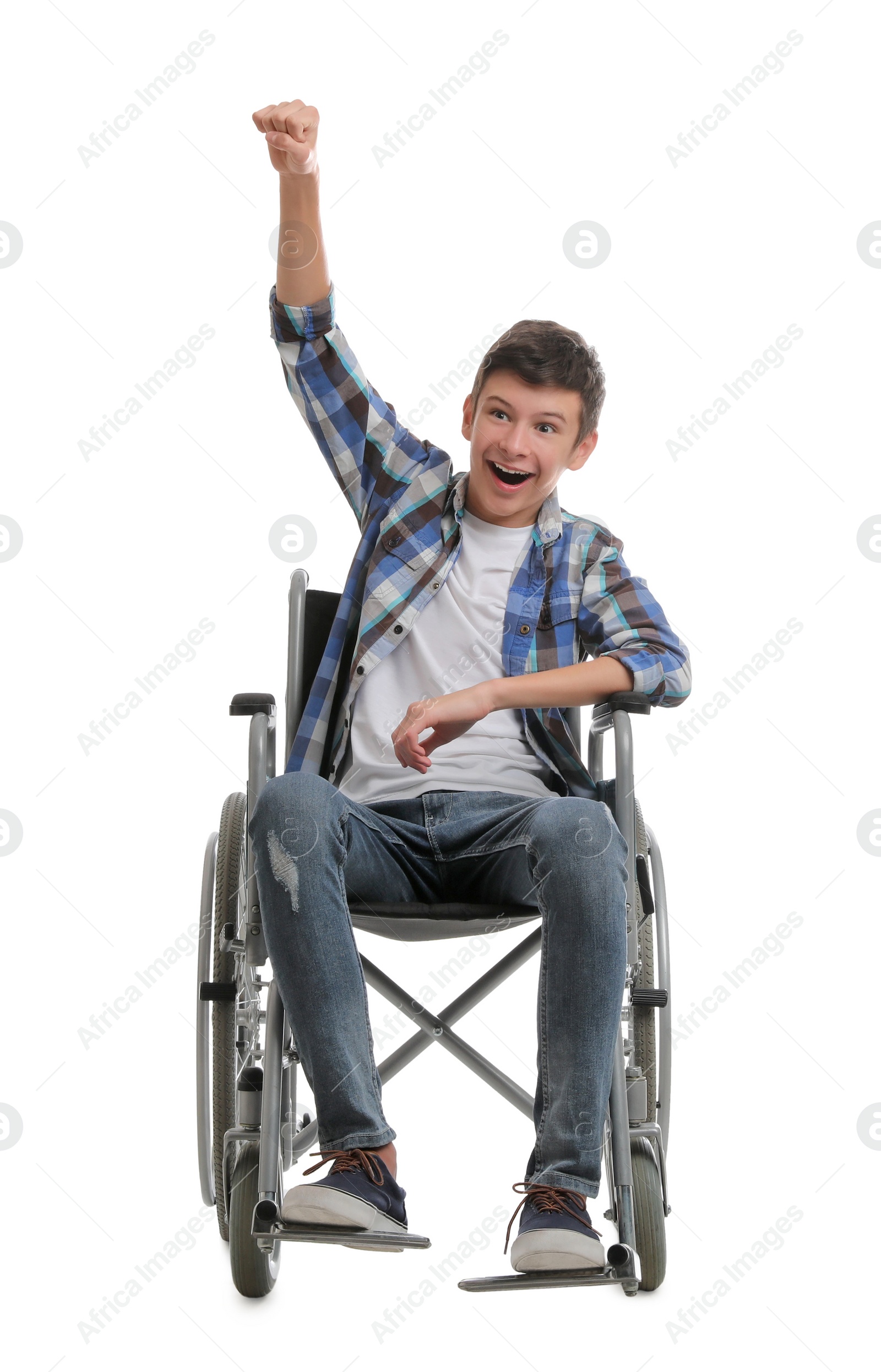 Photo of Emotional teen boy in wheelchair on white background
