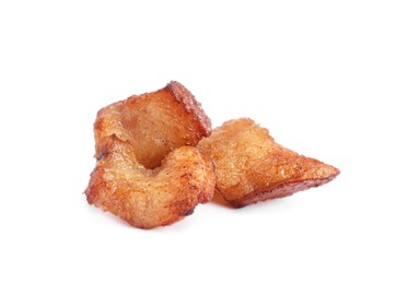 Tasty fried cracklings on white background. Cooked pork lard Photo of Tasty fried cracklings on white background. Cooked pork lard
