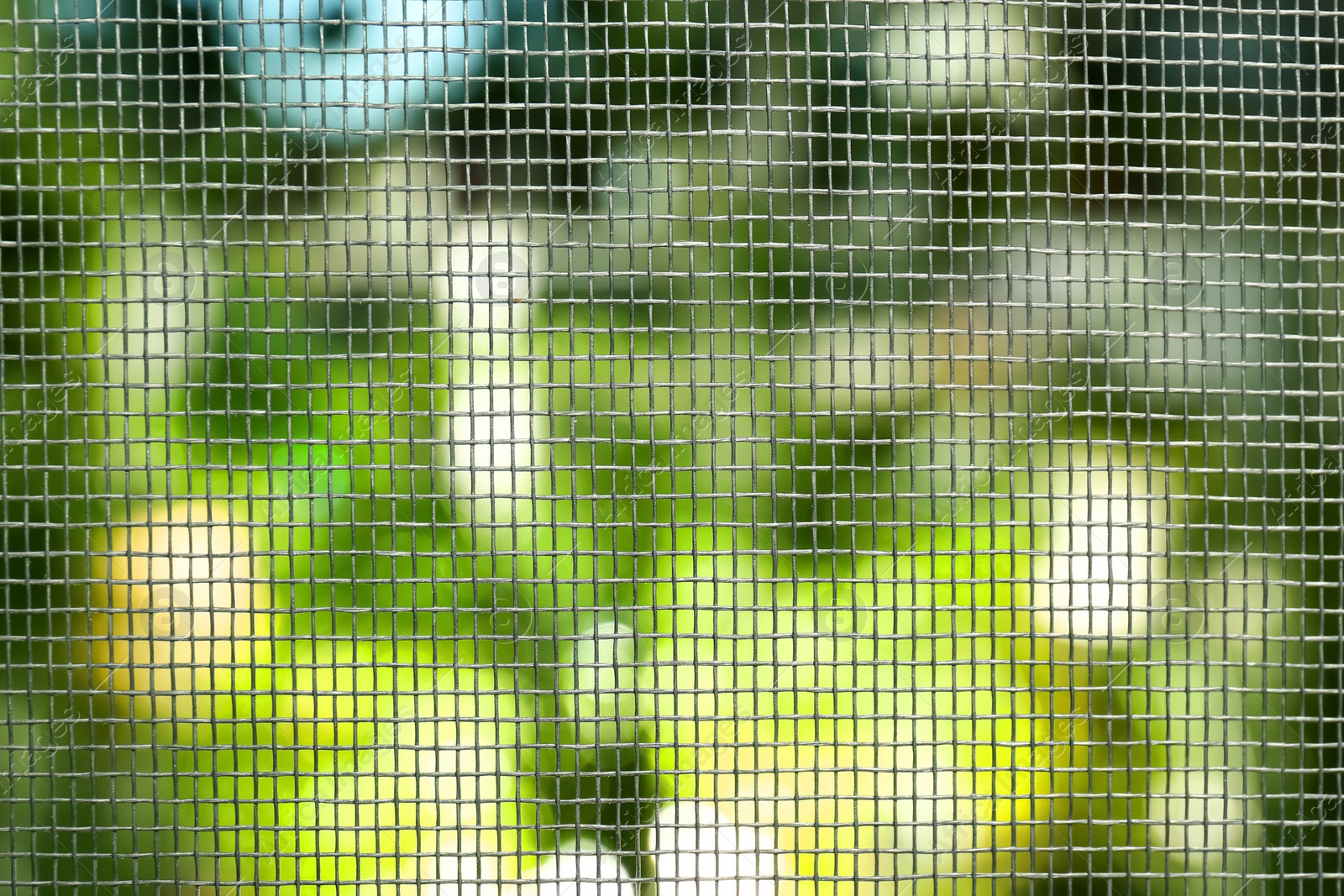 Insect screen for window against blurred background, closeup Photo of Insect screen for window against blurred background, closeup