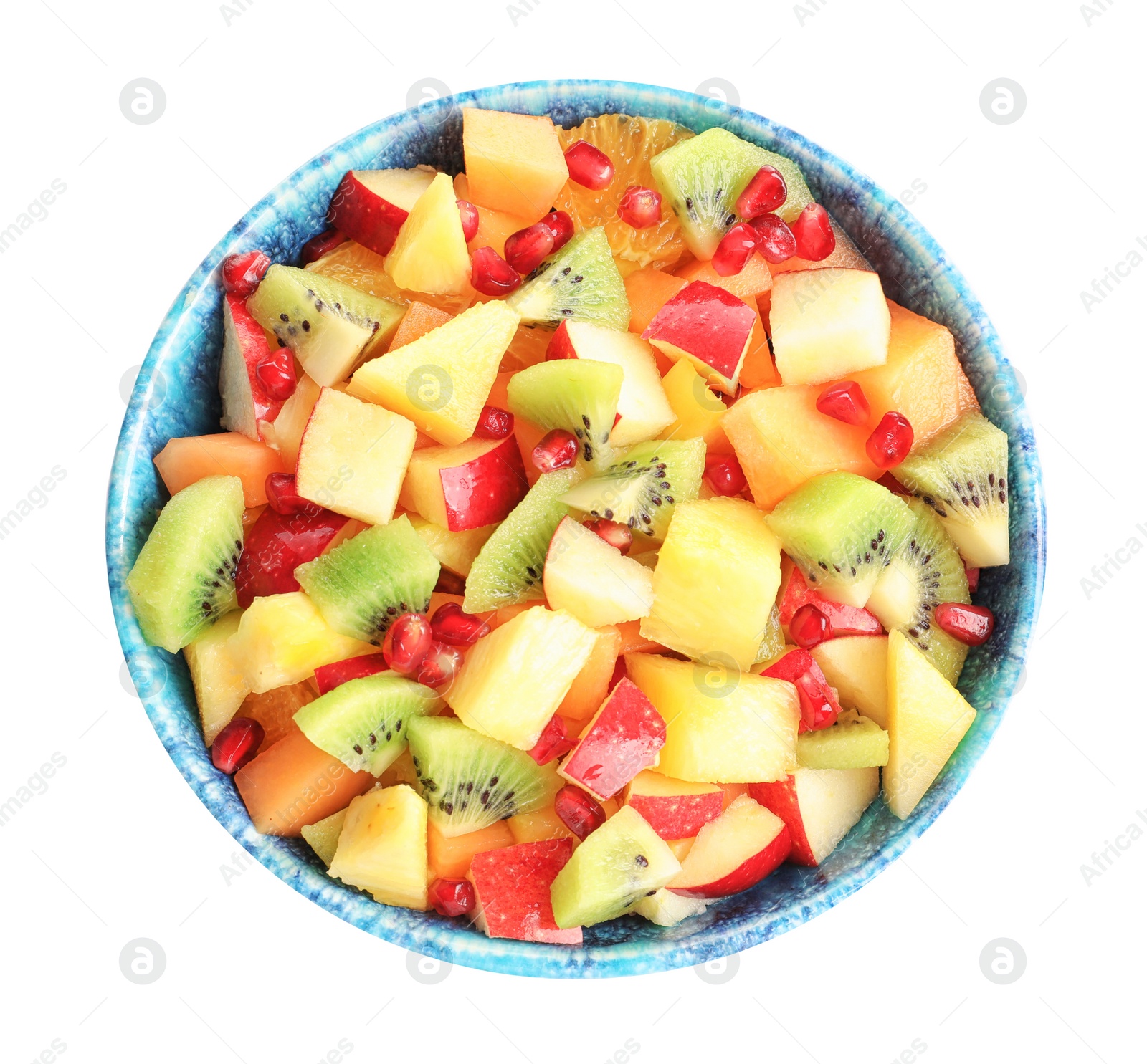 Bowl with fresh cut fruits on white background Photo of Bowl with fresh cut fruits on white background