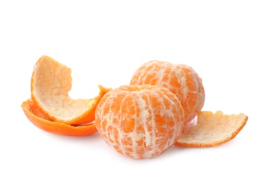 Peeled fresh tangerines on white background. Citrus fruit Photo of Peeled fresh tangerines on white background. Citrus fruit