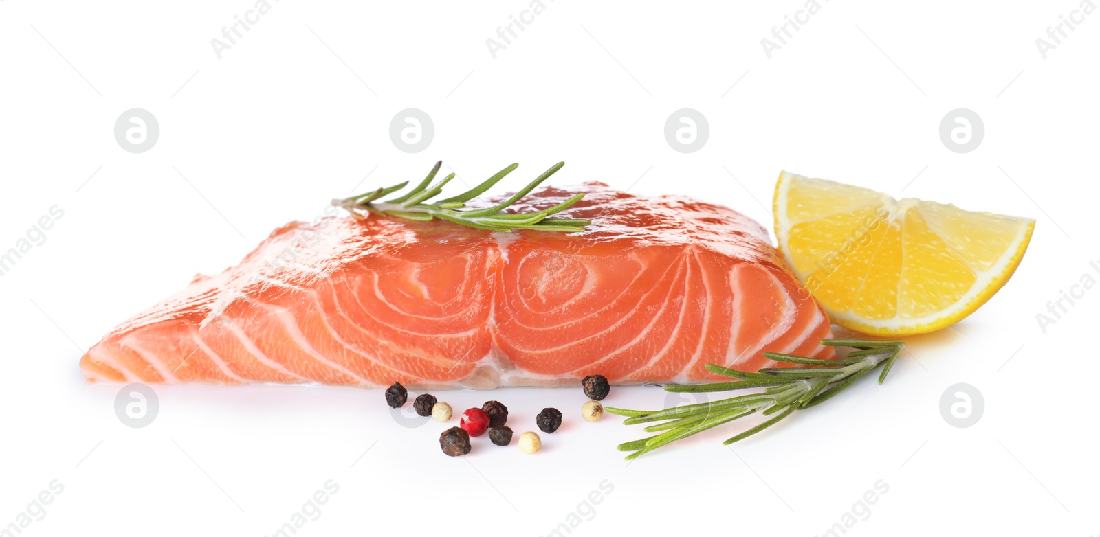 Fresh raw salmon with pepper, lemon and rosemary on white background. Fish delicacy Photo of Fresh raw salmon with pepper, lemon and rosemary on white background. Fish delicacy