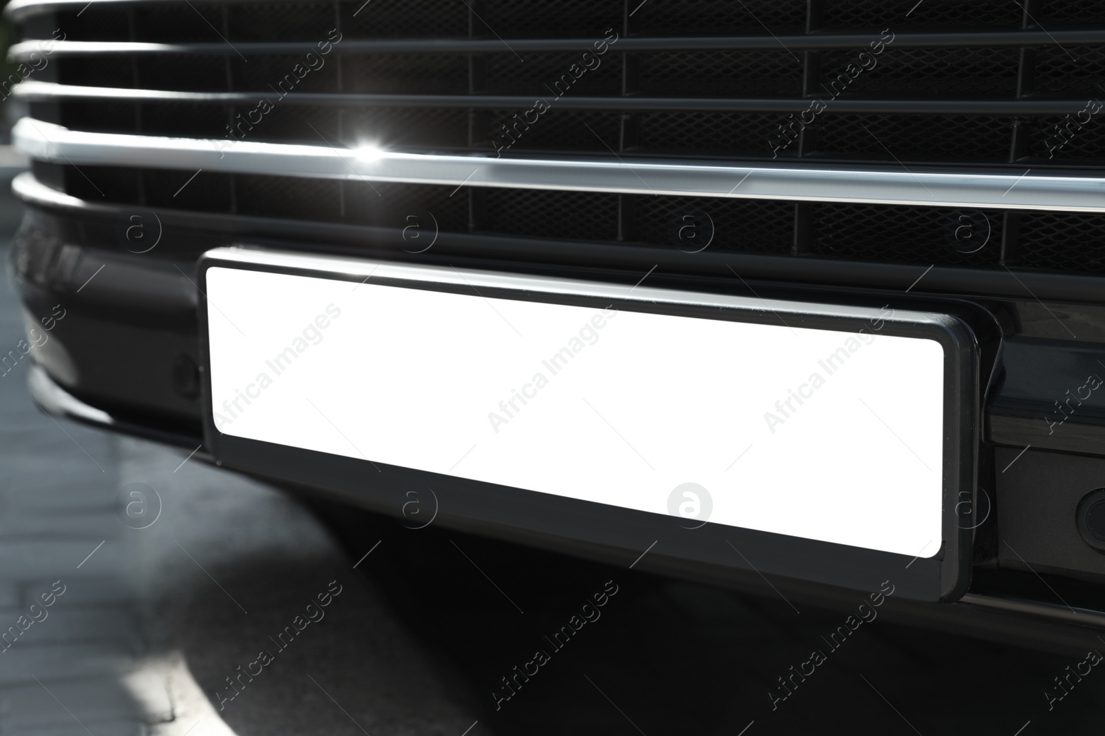 Car with vehicle registration plate outdoors, closeup. Mockup for design Photo of Car with vehicle registration plate outdoors, closeup. Mockup for design