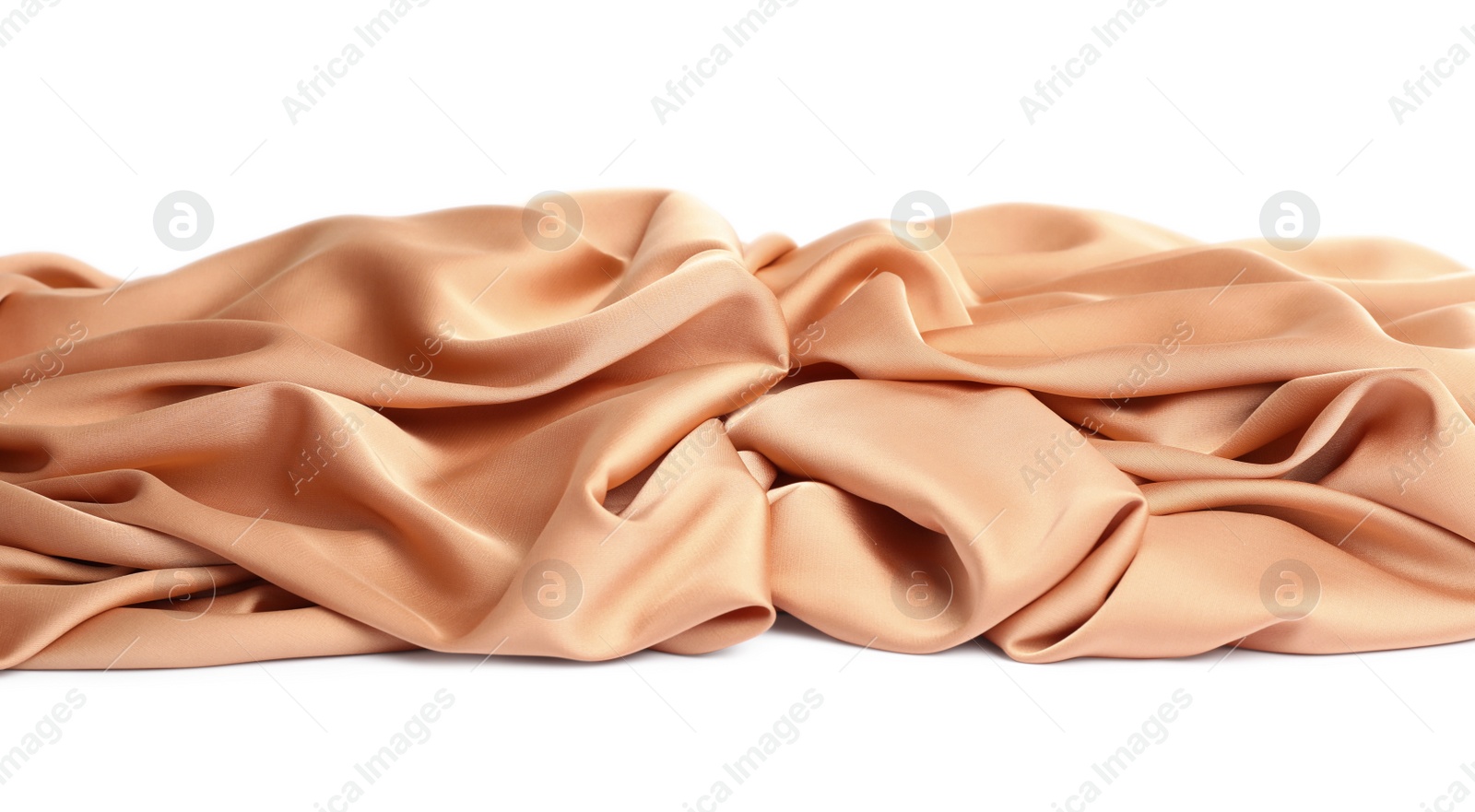Photo of Beautiful delicate peach silk on white background