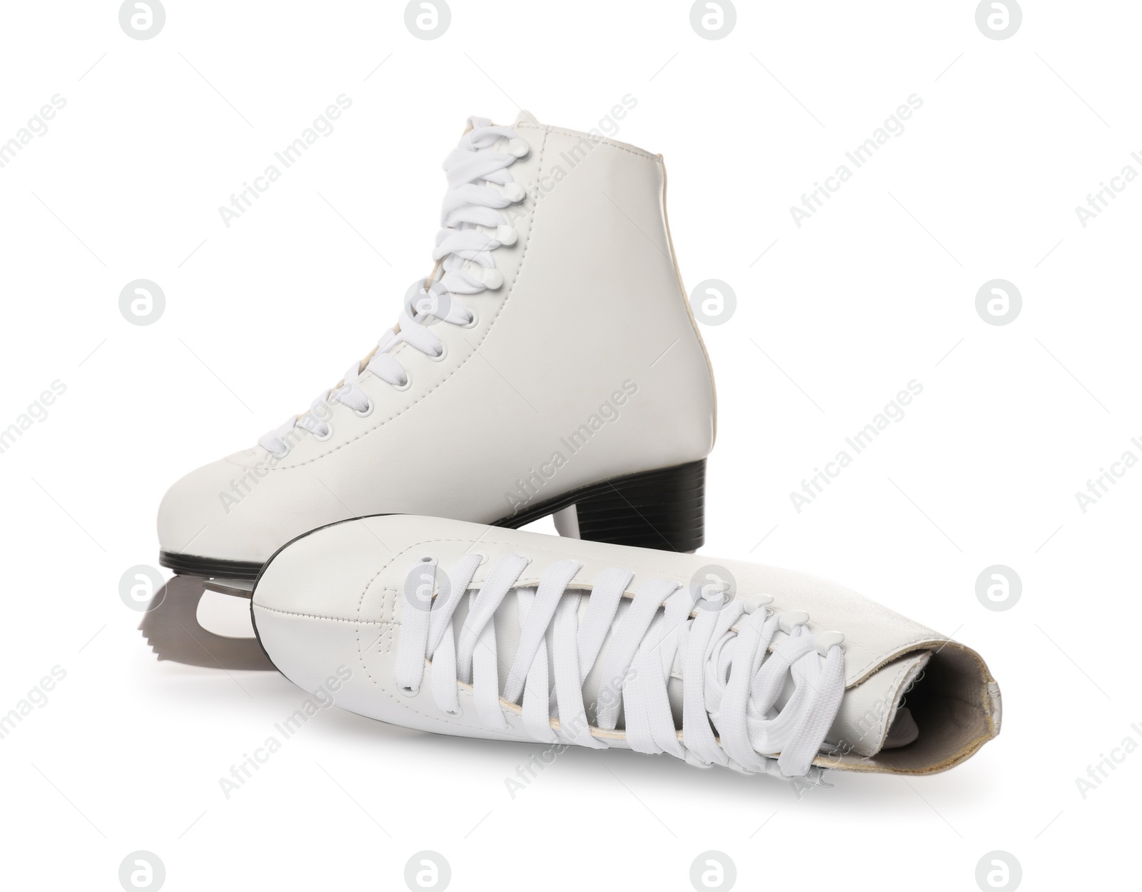 Pair of figure ice skates isolated on white Photo of Pair of figure ice skates isolated on white
