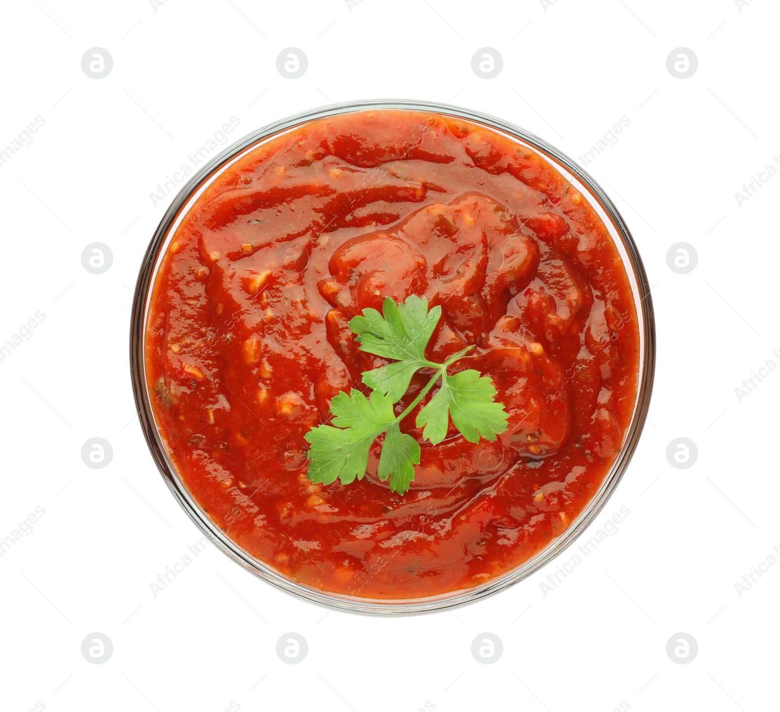 Delicious adjika sauce and parsley in bowl isolated on white, top view Photo of Delicious adjika sauce and parsley in bowl isolated on white, top view