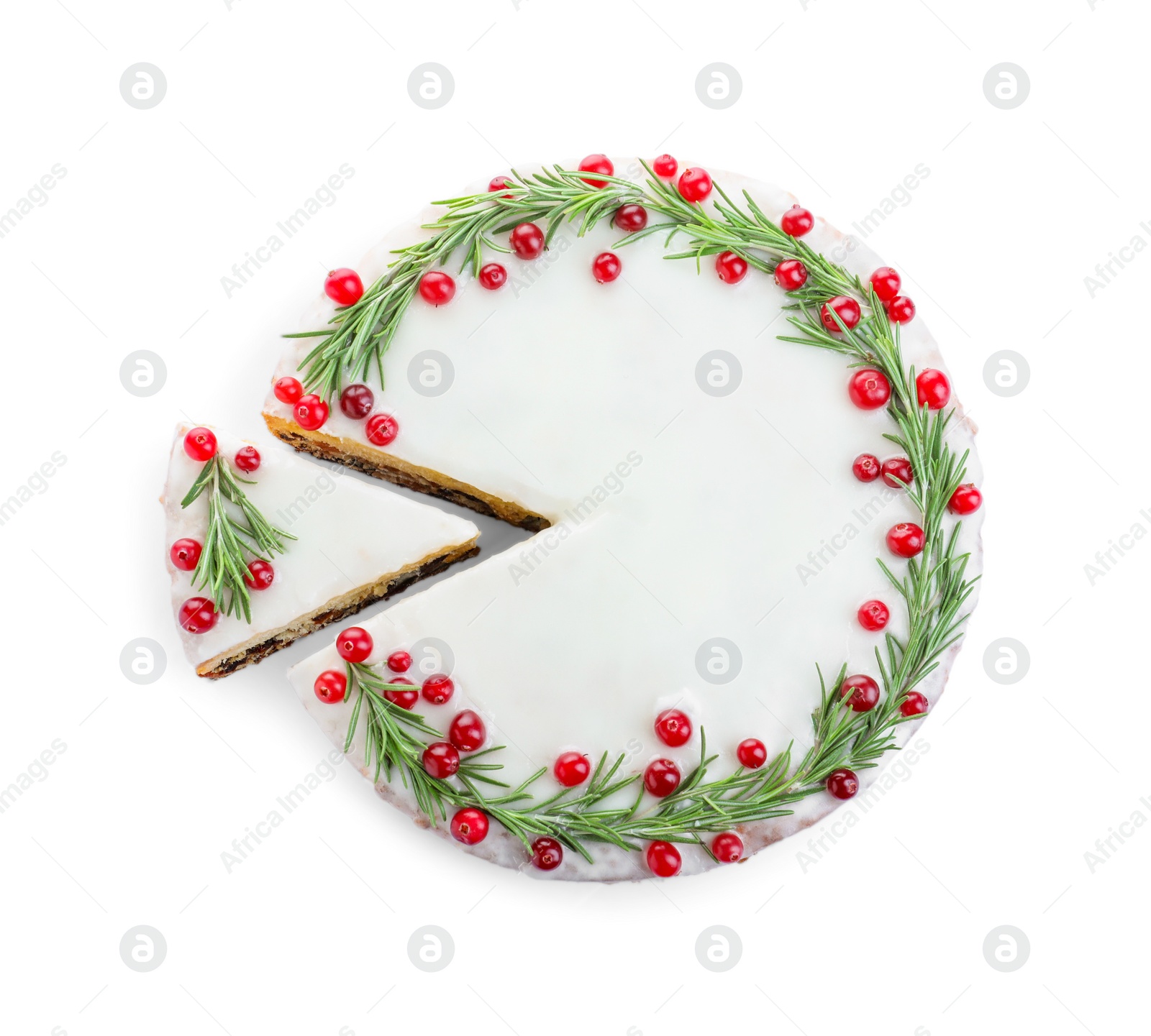 Traditional Christmas cake decorated with rosemary and cranberries isolated on white, top view Photo of Traditional Christmas cake decorated with rosemary and cranberries isolated on white, top view