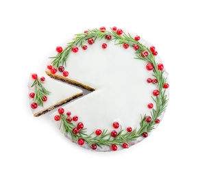 Traditional Christmas cake decorated with rosemary and cranberries isolated on white, top view Photo of Traditional Christmas cake decorated with rosemary and cranberries isolated on white, top view