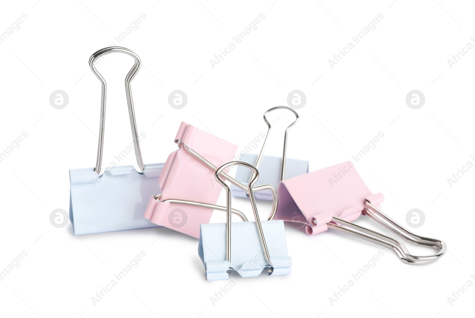 Colorful binder clips on white background. Stationery item Photo of Colorful binder clips on white background. Stationery item