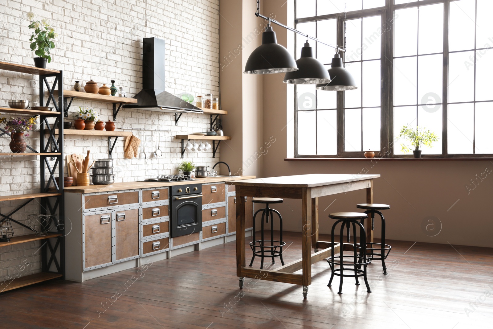 Beautiful kitchen interior with new modern oven and stylish furniture Photo of Beautiful kitchen interior with new modern oven and stylish furniture