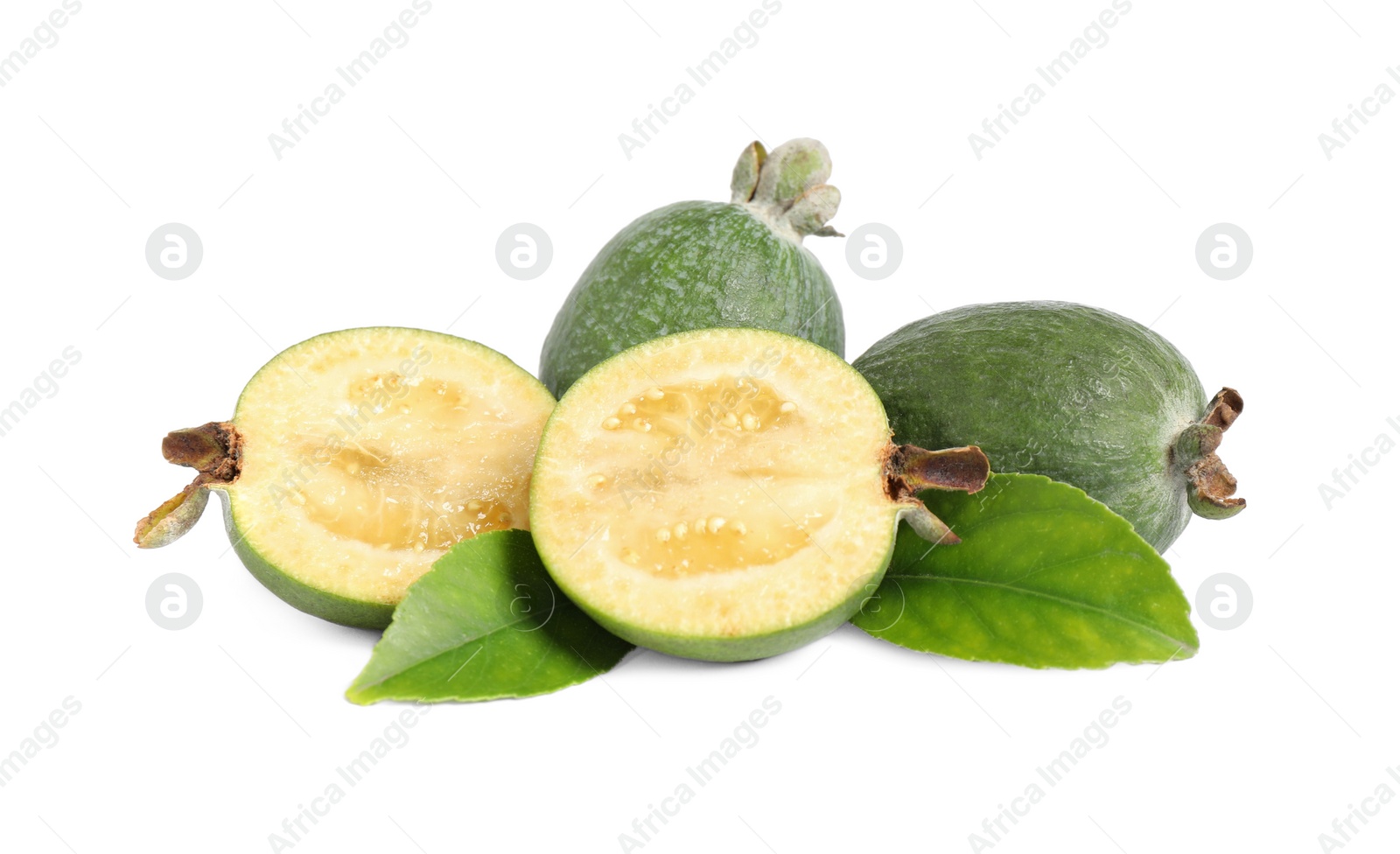 Pile of feijoas and leaves on white background Photo of Pile of feijoas and leaves on white background