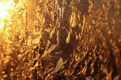 Beautiful frosty window as background, closeup. Winter morning Photo of Beautiful frosty window as background, closeup. Winter morning