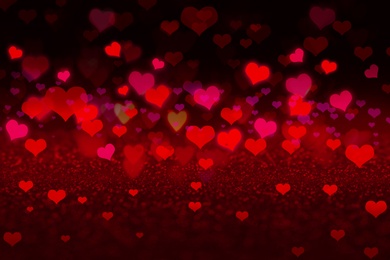 Beautiful heart shaped lights on color background, blurred view. Valentine's day Image of Beautiful heart shaped lights on color background, blurred view. Valentine's day