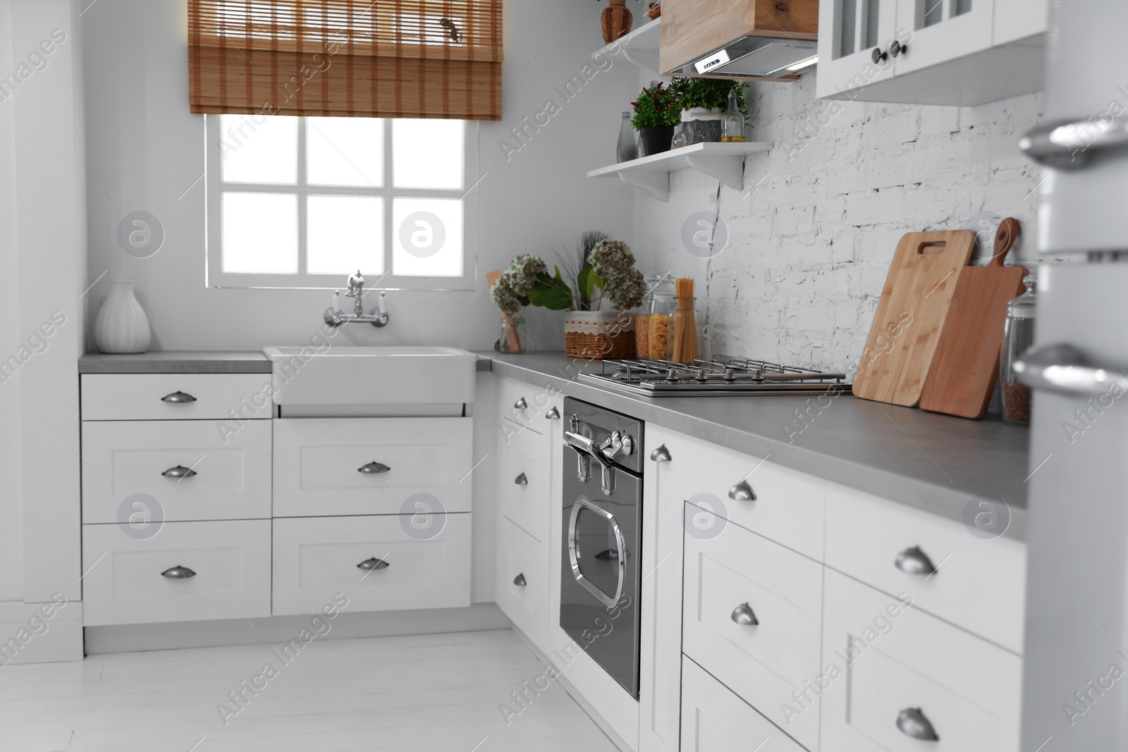 Photo of Beautiful kitchen interior with new stylish furniture