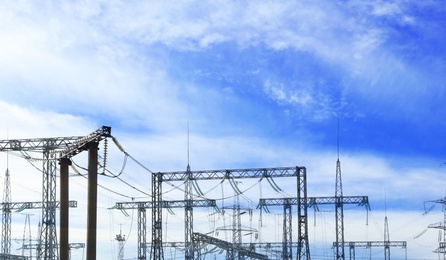 Modern electrical substation outdoors on sunny day Photo of Modern electrical substation outdoors on sunny day