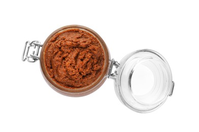 Delicious adjika sauce in glass jar isolated on white, top view Photo of Delicious adjika sauce in glass jar isolated on white, top view