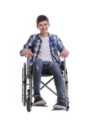 Teen boy in wheelchair on white background Photo of Teen boy in wheelchair on white background