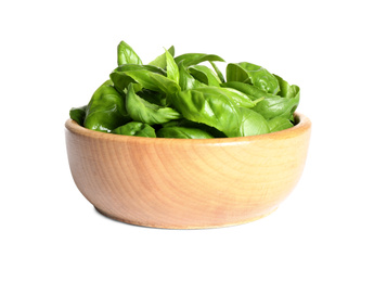 Photo of Fresh green basil leaves in wooden bowl isolated on white