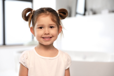 Cute little girl in bathroom. Space for text
Photo of Cute little girl in bathroom. Space for text
