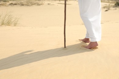 Jesus Christ walking in desert, closeup view Photo of Jesus Christ walking in desert, closeup view
