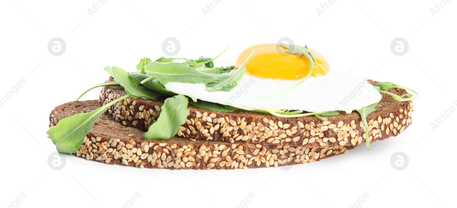Delicious sandwich with arugula and fried egg isolated on white Photo of Delicious sandwich with arugula and fried egg isolated on white