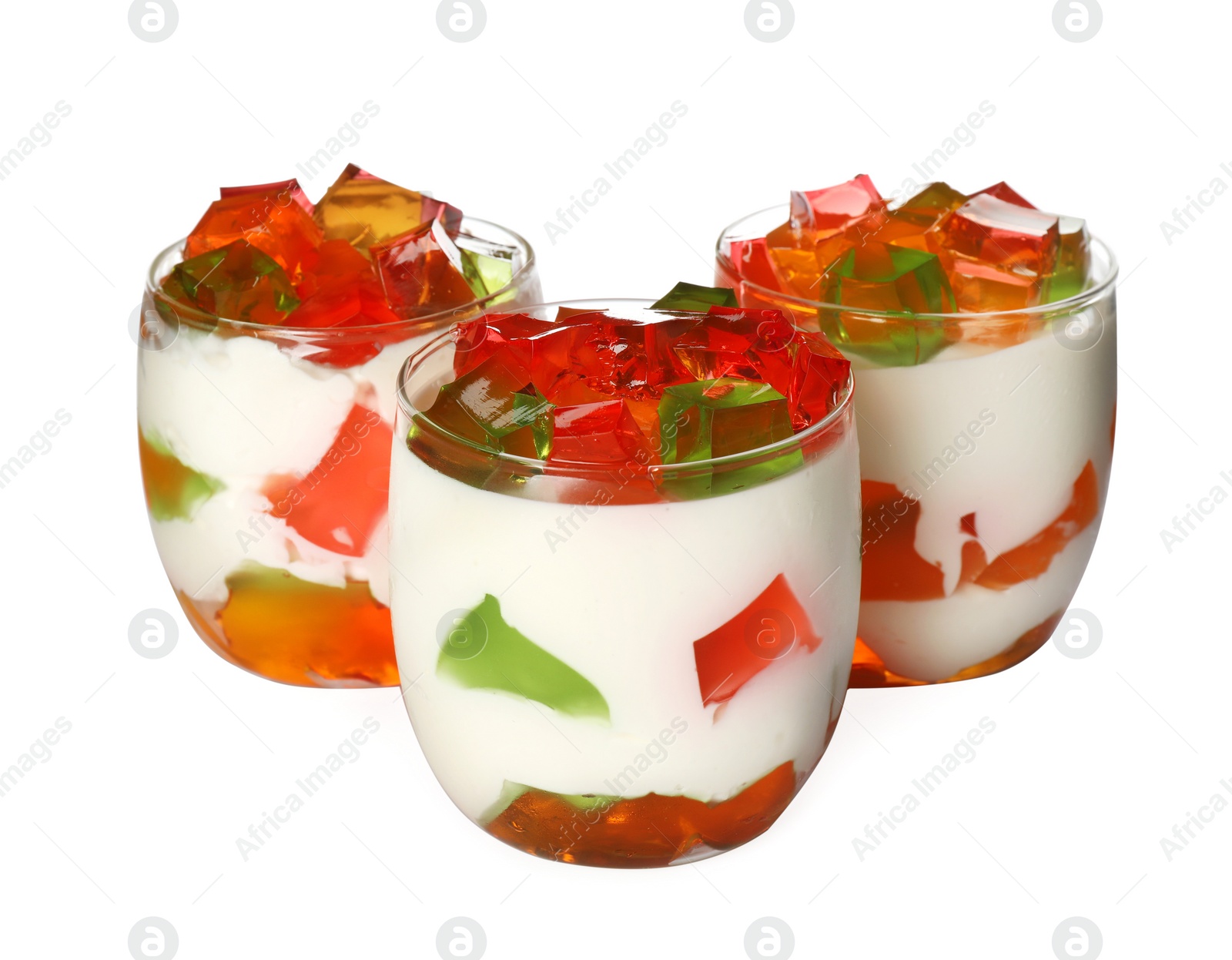 Delicious jelly dessert Broken glass on white background Photo of Delicious jelly dessert Broken glass on white background