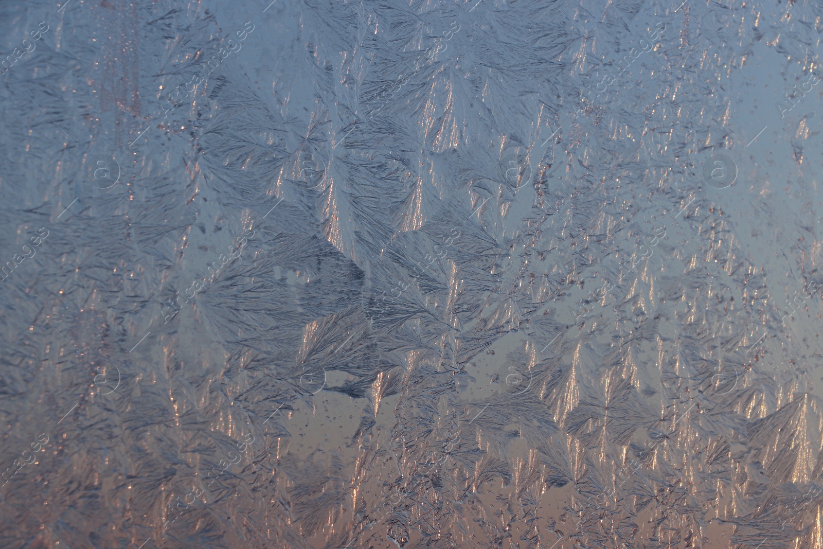 Photo of Beautiful frosty window as background, closeup. Winter morning