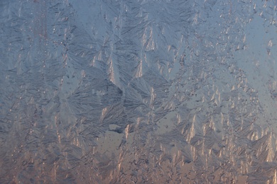 Photo of Beautiful frosty window as background, closeup. Winter morning
