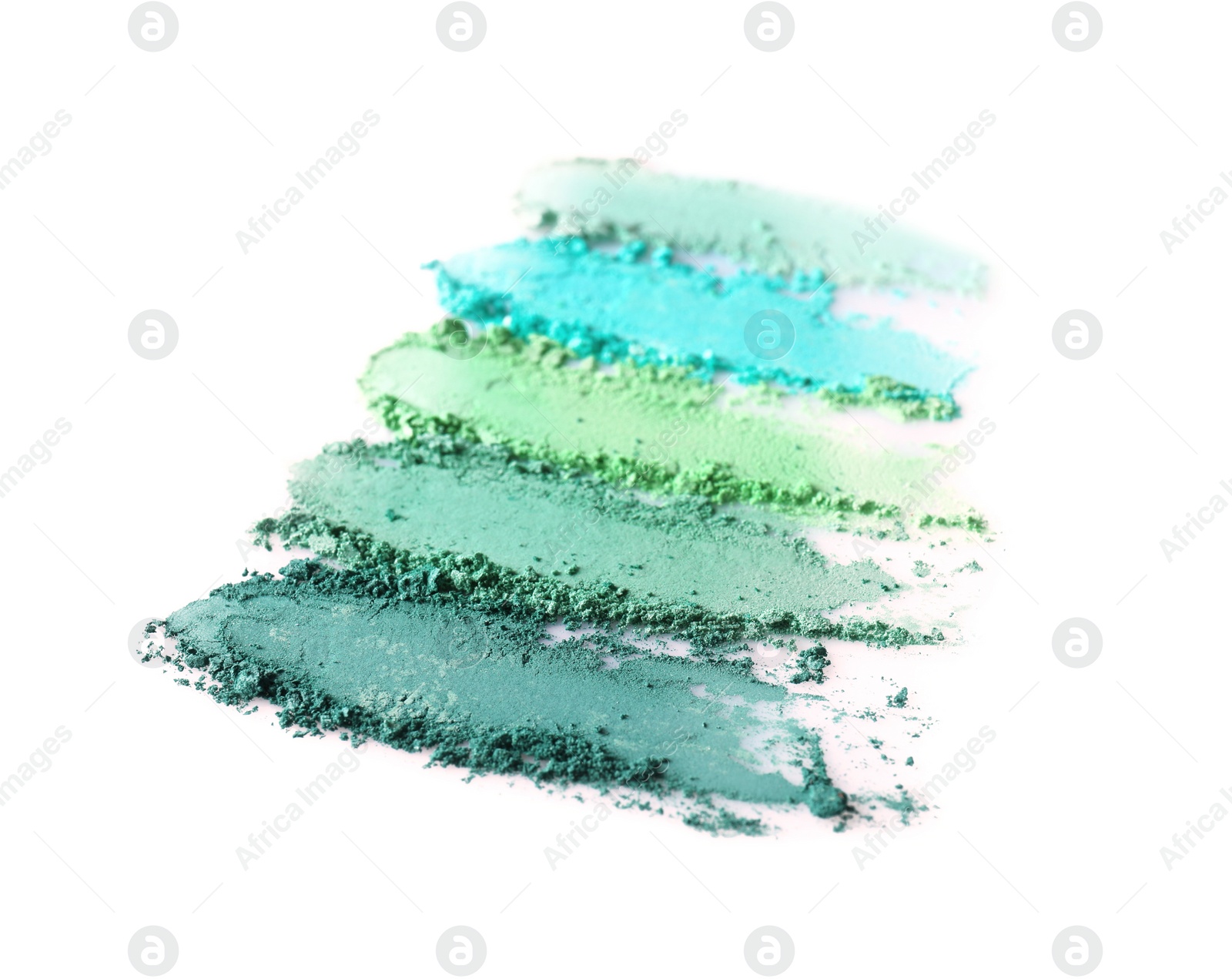 Crushed eye shadows on white background. Professional makeup products Photo of Crushed eye shadows on white background. Professional makeup products