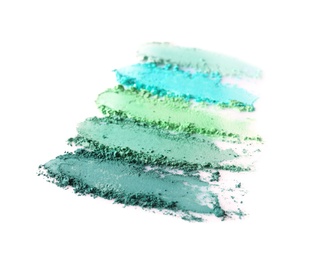 Crushed eye shadows on white background. Professional makeup products Photo of Crushed eye shadows on white background. Professional makeup products
