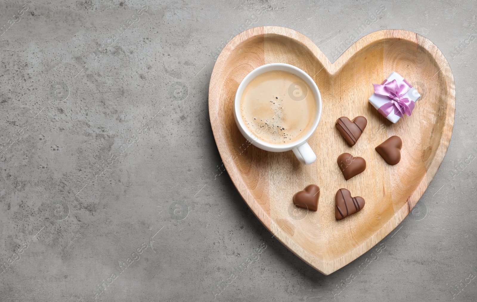 Romantic breakfast on grey table, top view with space for text. Valentine's day celebration Photo of Romantic breakfast on grey table, top view with space for text. Valentine's day celebration