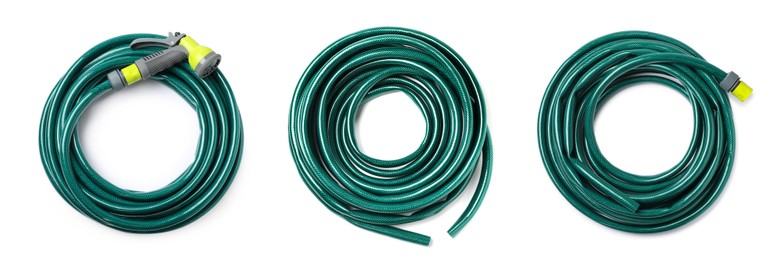 Set with green rubber watering hoses on white background, top view. Banner design Image of Set with green rubber watering hoses on white background, top view. Banner design