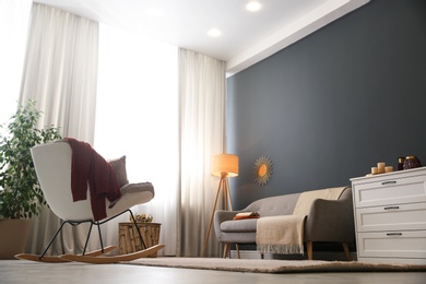 Photo of Cozy living room interior inspired by autumn colors, low angle view