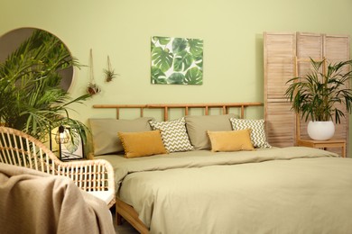 Photo of Stylish bedroom with modern furniture. Interior design