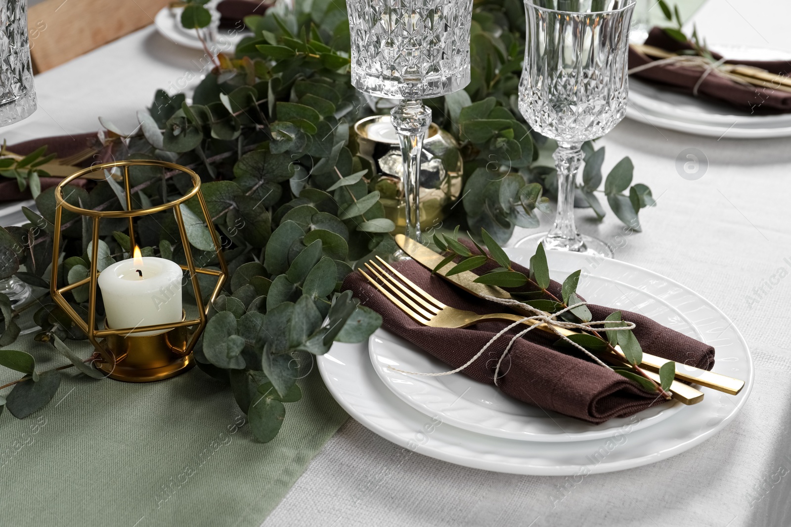 Stylish elegant table setting for festive dinner Photo of Stylish elegant table setting for festive dinner