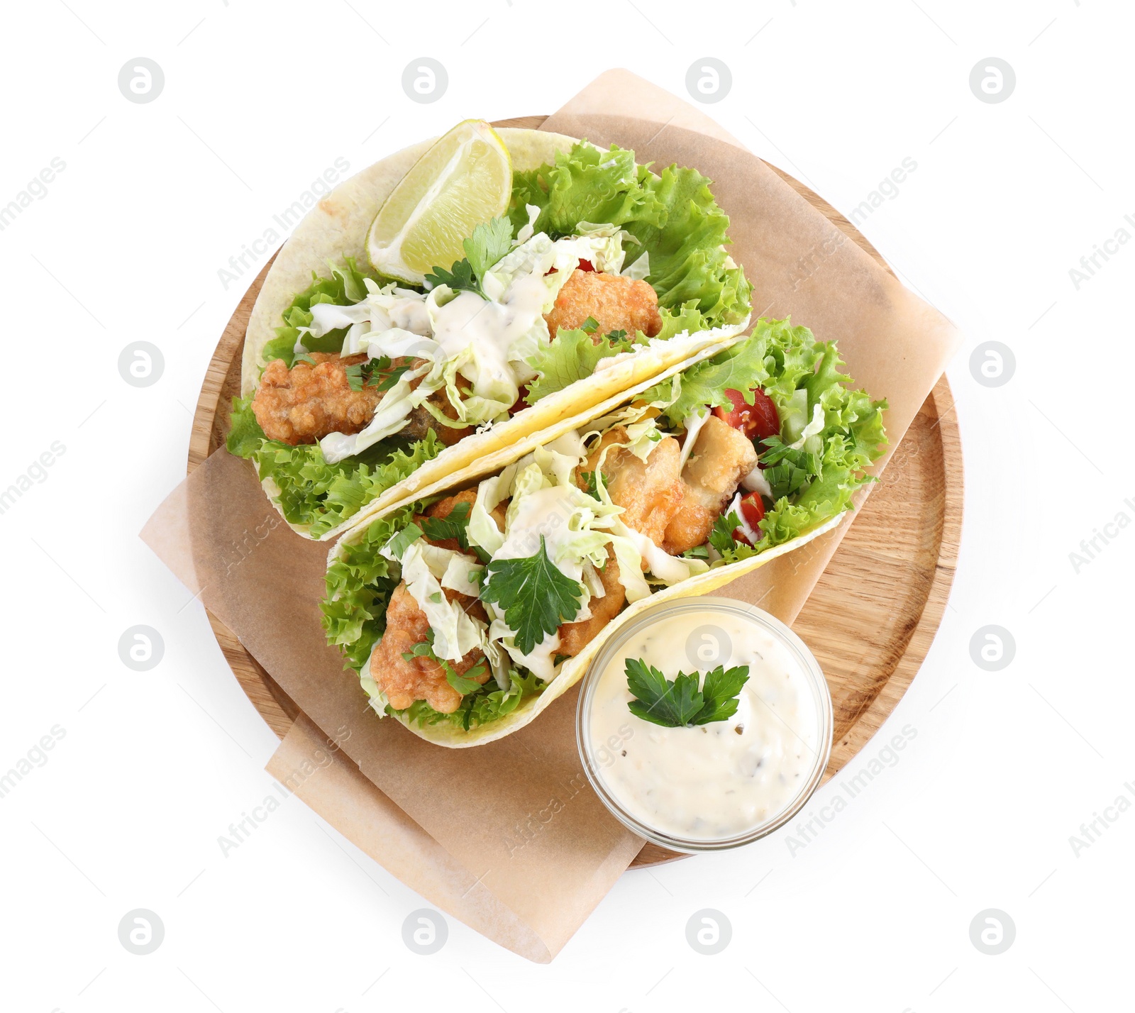 Yummy fish tacos with sauce isolated on white, top view Photo of Yummy fish tacos with sauce isolated on white, top view