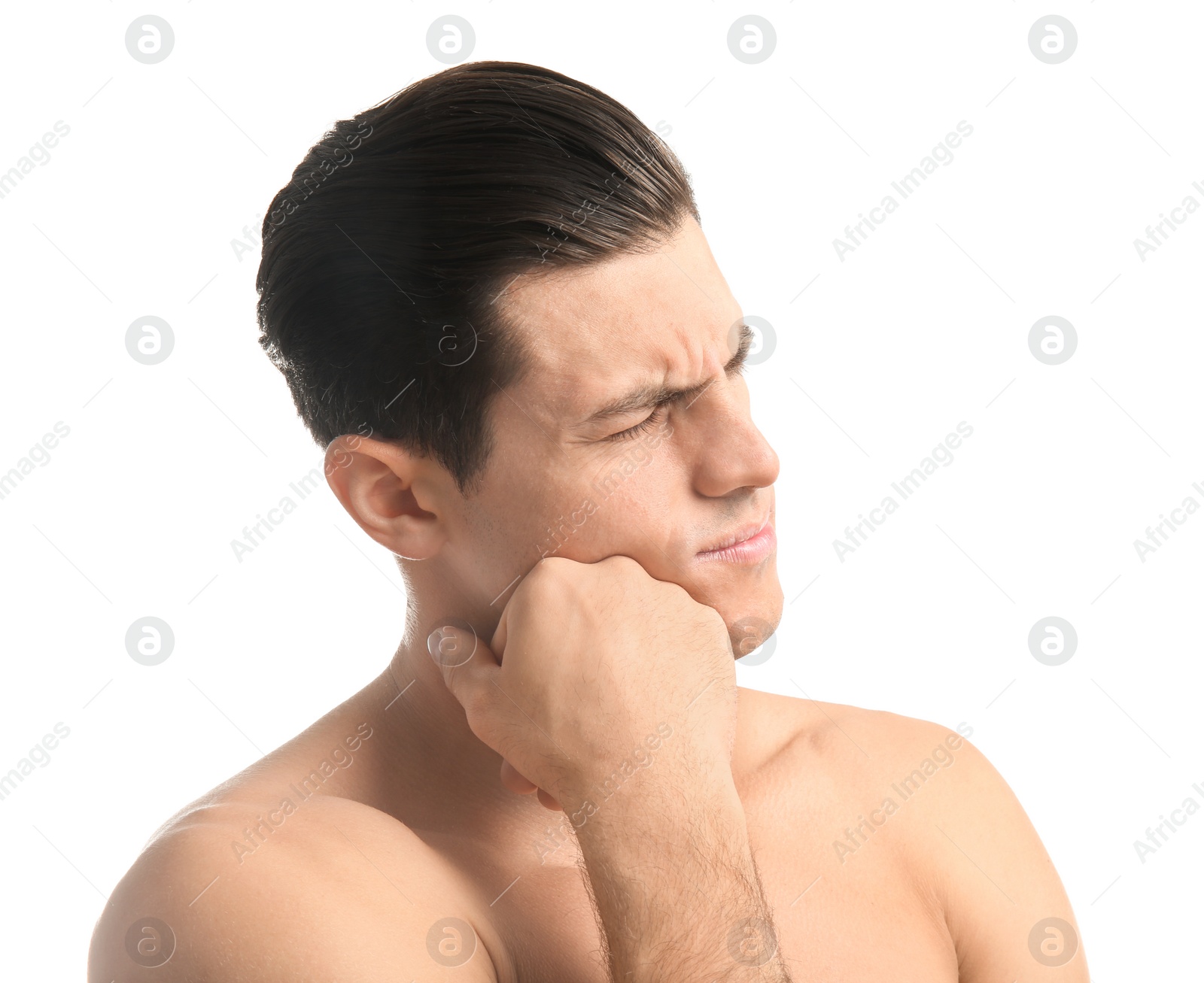 Young man suffering from toothache on white background Photo of Young man suffering from toothache on white background