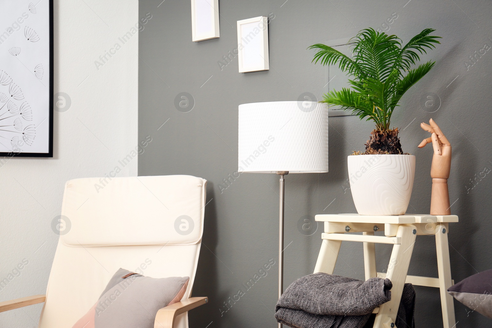 Stylish interior design with tropical leaves Photo of Stylish interior design with tropical leaves