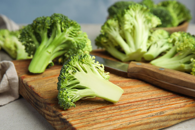 Fresh green broccoli on light table. Organic food Photo of Fresh green broccoli on light table. Organic food