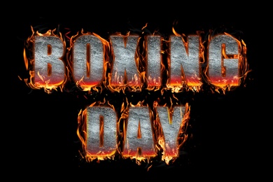 Flaming text Boxing Day on black background Image of Flaming text Boxing Day on black background