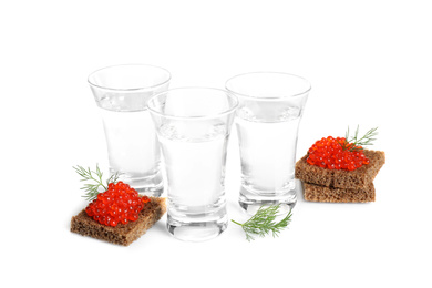 Russian vodka and red caviar sandwiches isolated on white Photo of Russian vodka and red caviar sandwiches isolated on white