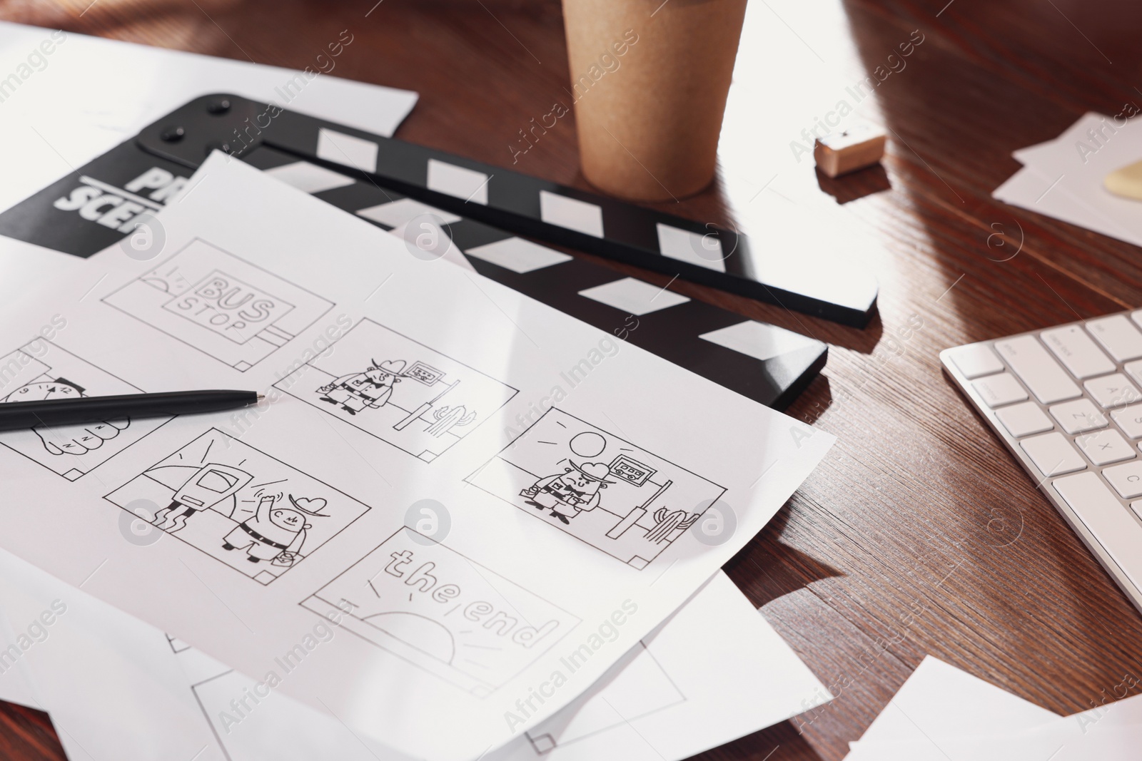 Storyboard with cartoon sketches at workplace. Pre-production process Photo of Storyboard with cartoon sketches at workplace. Pre-production process