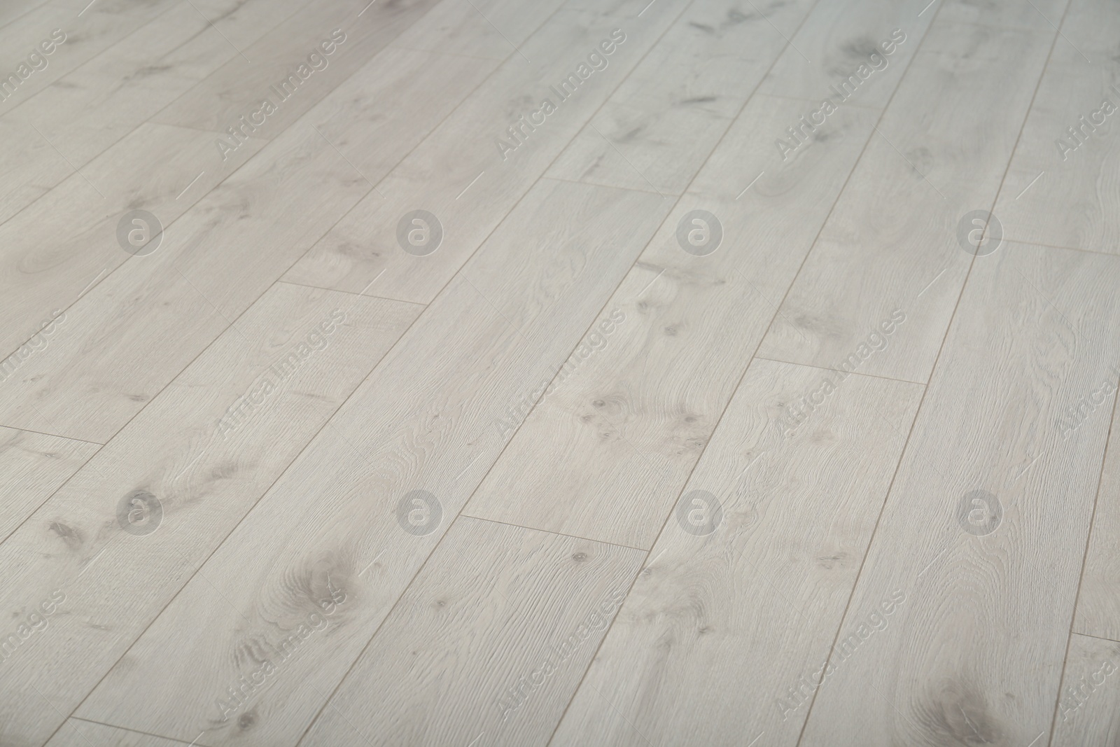 Photo of Light wooden laminate as background. Floor covering