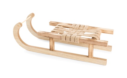 Photo of Wooden sleigh isolated on white. Christmas holiday decor