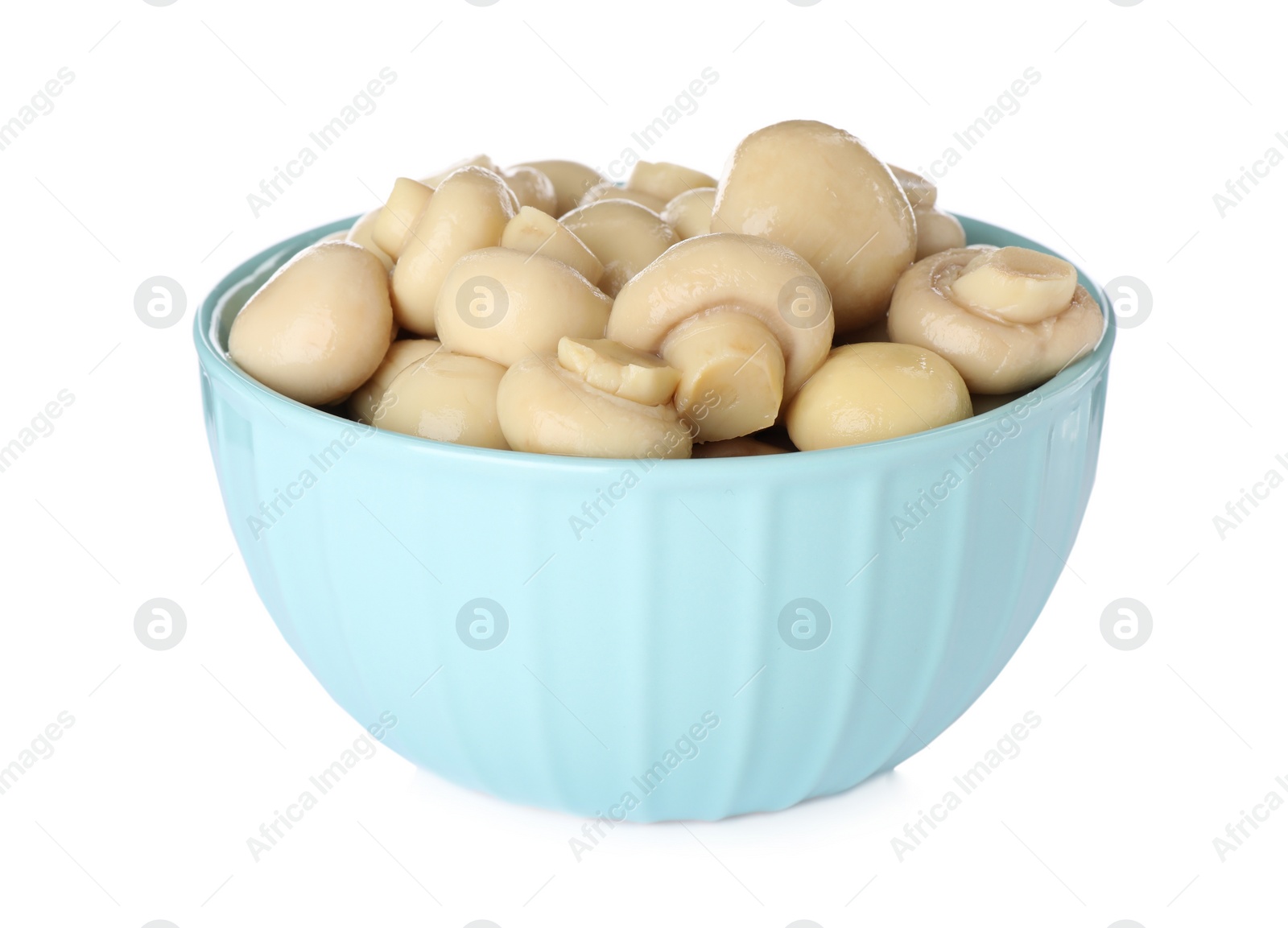 Tasty marinated mushrooms in bowl isolated on white Photo of Tasty marinated mushrooms in bowl isolated on white
