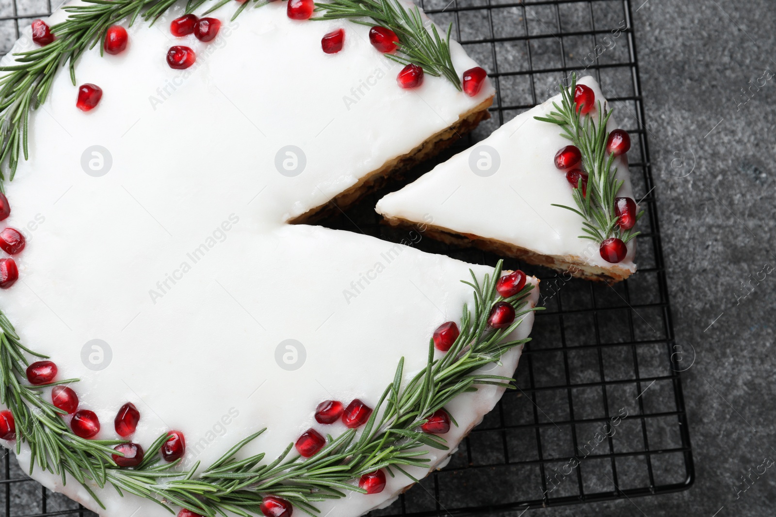 Flat lay composition with traditional Christmas cake on grey table Photo of Flat lay composition with traditional Christmas cake on grey table