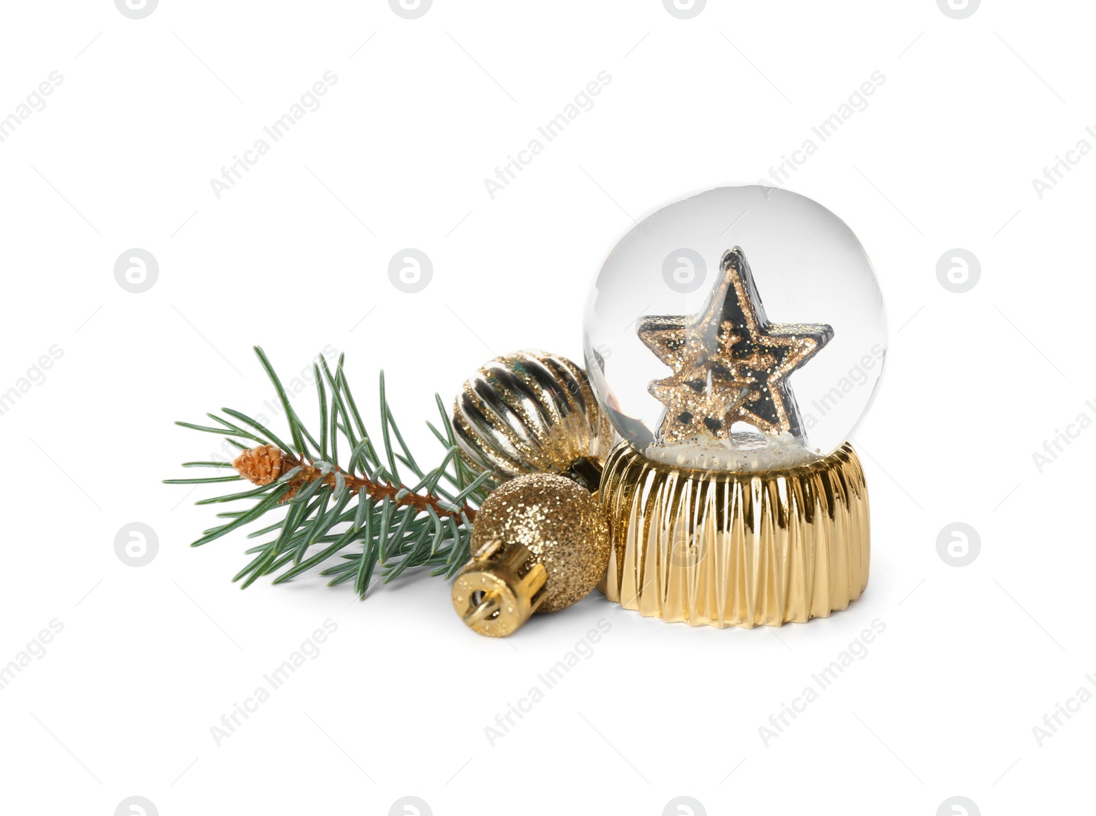Beautiful snow globe, Christmas balls and fir branch on white background Photo of Beautiful snow globe, Christmas balls and fir branch on white background