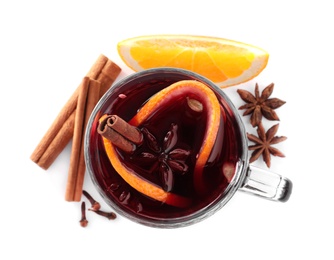Aromatic mulled wine and ingredients on white background, top view Photo of Aromatic mulled wine and ingredients on white background, top view