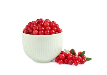 Fresh ripe cranberries with leaves on white background Photo of Fresh ripe cranberries with leaves on white background