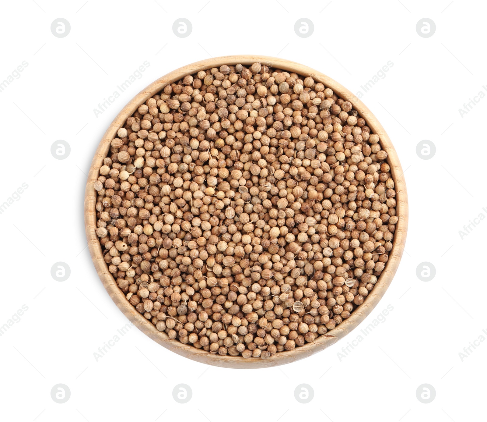 Dried coriander seeds in wooden bowl on white background, top view Photo of Dried coriander seeds in wooden bowl on white background, top view